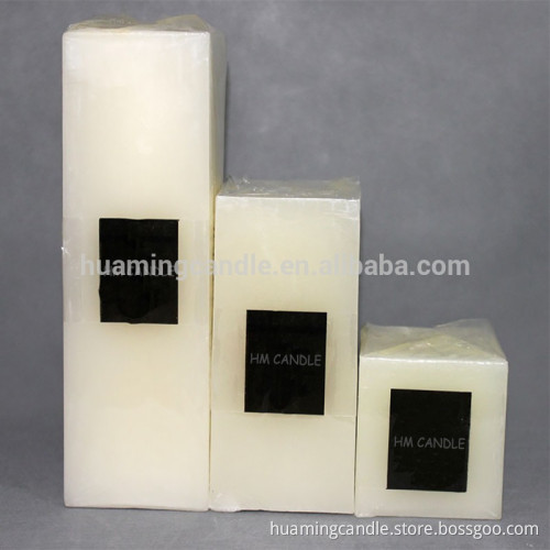 white pillar Party decorated candle